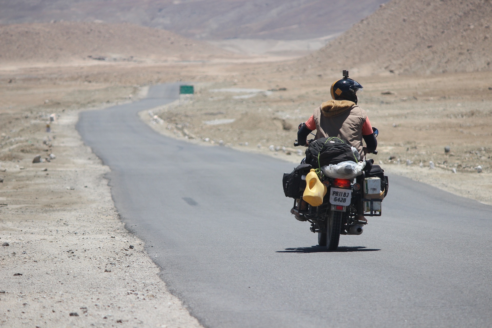 experience the windy hilly ways, travel on motorbike 